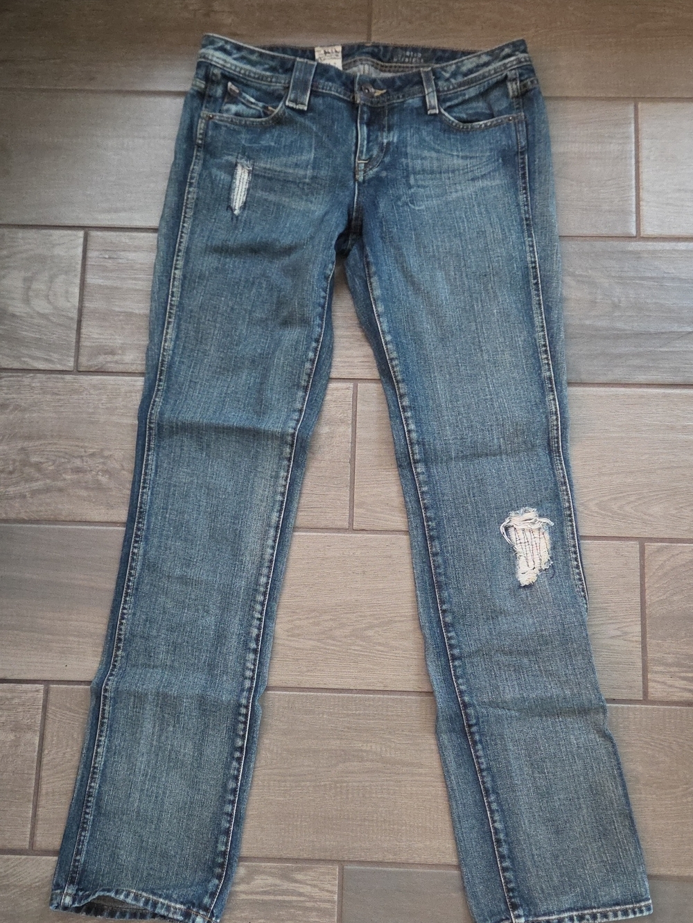 Volcom Women's Straight Leg Jeans in Medium Blue with Distressed Knee